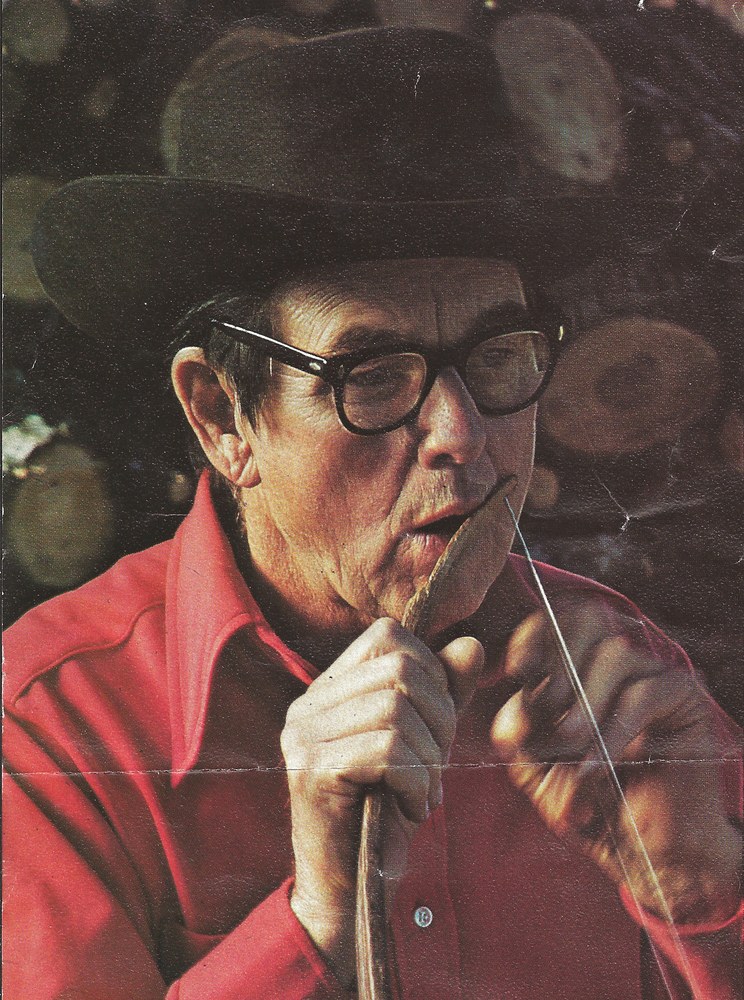 Jimmy Driftwood playing his handmade mouth bow